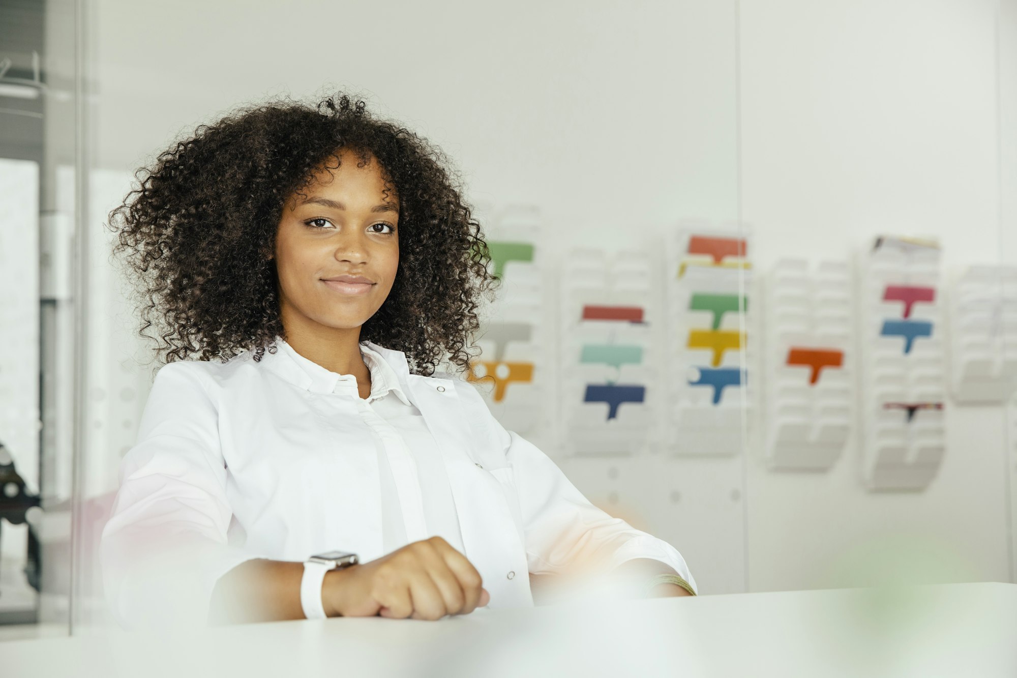 Portrait of smiling female scientist in lab